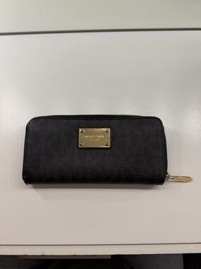 Michael Kors Black Saffiano Zip Wallet with Gold Plaque